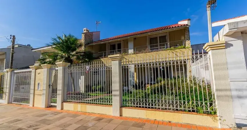 Casa com 4 quartos à venda na Rua Vinícius de Moraes, 363, Marechal Rondon, Canoas