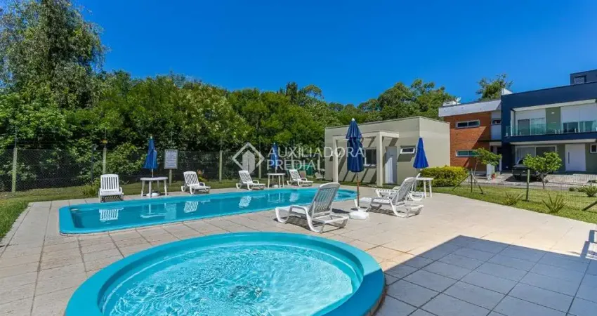 Casa em condomínio fechado com 3 quartos à venda na Rua Eroni Soares Machado, 300, Hípica, Porto Alegre