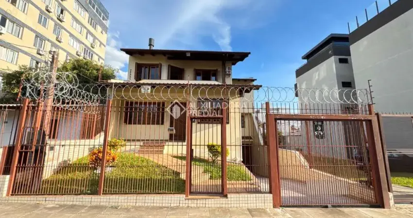 Casa com 4 quartos à venda na Rua Oito de Julho, 75, Jardim Botânico, Porto Alegre
