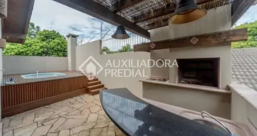 Casa em condomínio fechado com 4 quartos à venda na Travessa Pedra Redonda, 142, Jardim Isabel, Porto Alegre