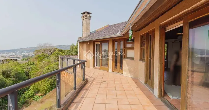 Casa com 4 quartos à venda na Praça Doutor Baltazar de Bem, 128, Vila Jardim, Porto Alegre