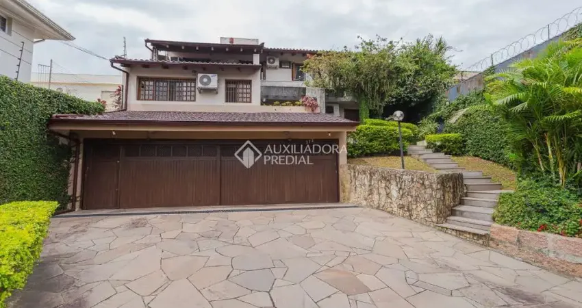 Casa com 4 quartos à venda na Rua João Paetzel, 173, Chácara das Pedras, Porto Alegre