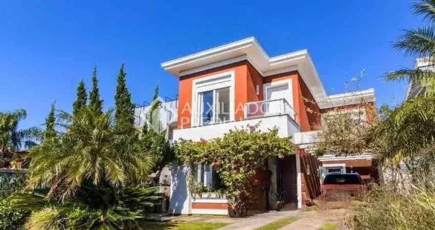 Casa em condomínio fechado com 4 quartos à venda na Avenida Juca Batista, 8000, Belém Novo, Porto Alegre