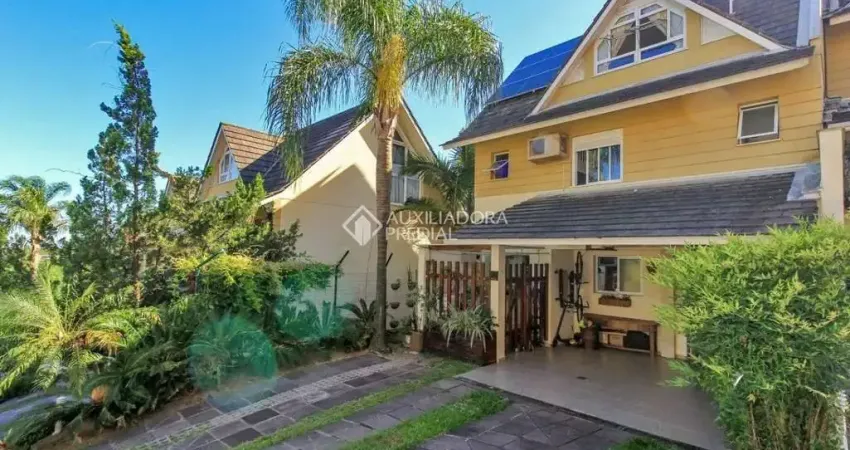 Casa em condomínio fechado com 3 quartos à venda na Avenida Engenheiro Ludolfo Boehl, 1179, Teresópolis, Porto Alegre
