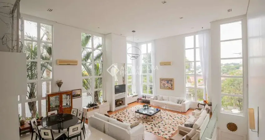 Casa com 3 quartos à venda na Rua Alcides Gonzaga, 220, Boa Vista, Porto Alegre