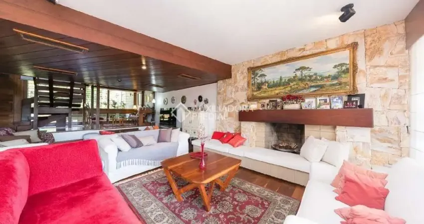 Casa com 5 quartos à venda na Rua Gustavo Schmidt, 125, Três Figueiras, Porto Alegre