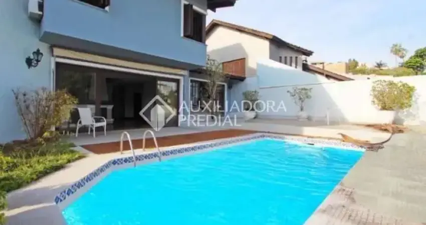 Casa com 4 quartos à venda na Rua Miracema, 15, Chácara das Pedras, Porto Alegre