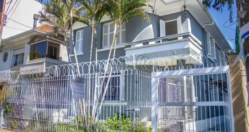 Casa com 5 quartos à venda na Rua João Guimarães, 978, Santa Cecília, Porto Alegre
