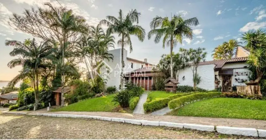 Casa com 5 quartos à venda na Rua Coroados, 1255, Vila Assunção, Porto Alegre