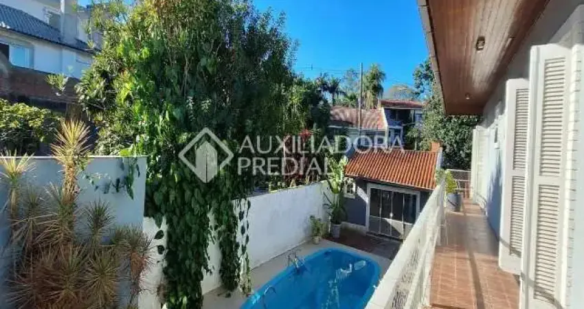 Casa com 4 quartos à venda na Rua José Pedro de Moura, 39, Jardim Isabel, Porto Alegre