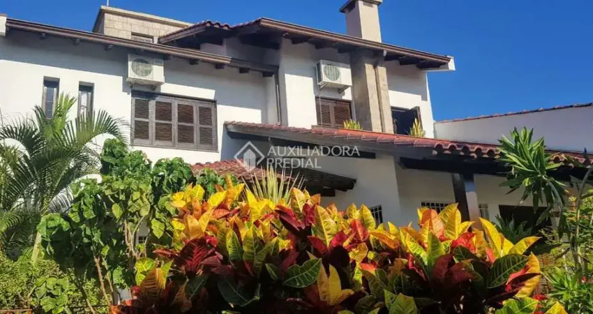 Casa com 3 quartos à venda na Rua Arnaldo Ballve, 709, Jardim Itu Sabará, Porto Alegre