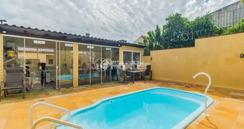 Casa com 3 quartos à venda na Rua Lloyd de Andrade Polidoro, 55, Ipanema, Porto Alegre
