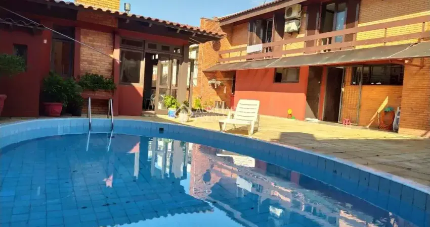 Casa com 4 quartos à venda na Rua Professor Fernando Carneiro, 287, Três Figueiras, Porto Alegre