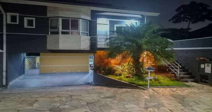 Casa com 3 dormitórios à venda, 286 m² por R$ 1.300.000,00 - Parque Nova Jandira - Jandira/SP