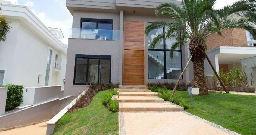 Sobrado à venda em santana de parnaíba, alphaville, com 4 suítes, com 556.09 m², gênesis 2