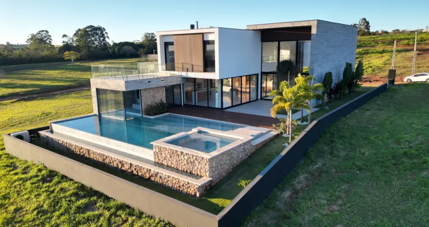 Mansão 4 suítes no riviera | 800m² | piscina, spa e sauna interligados com vista para a represa jurumirim