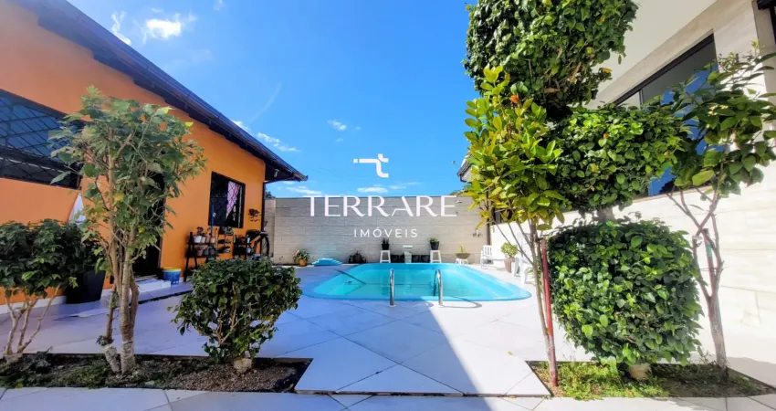 Casa à venda em biguaçu (sc) — 3 quartos, suíte, piscina, energia solar e 6 vagas de garagem