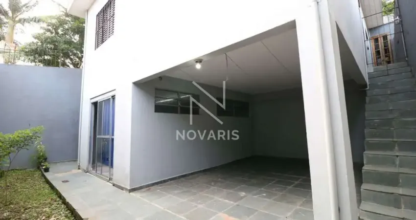 Casa térrea terreno com 300m² com 3 dormitórios sendo 1 suíte, 5 vagas - Parque Maria Helena