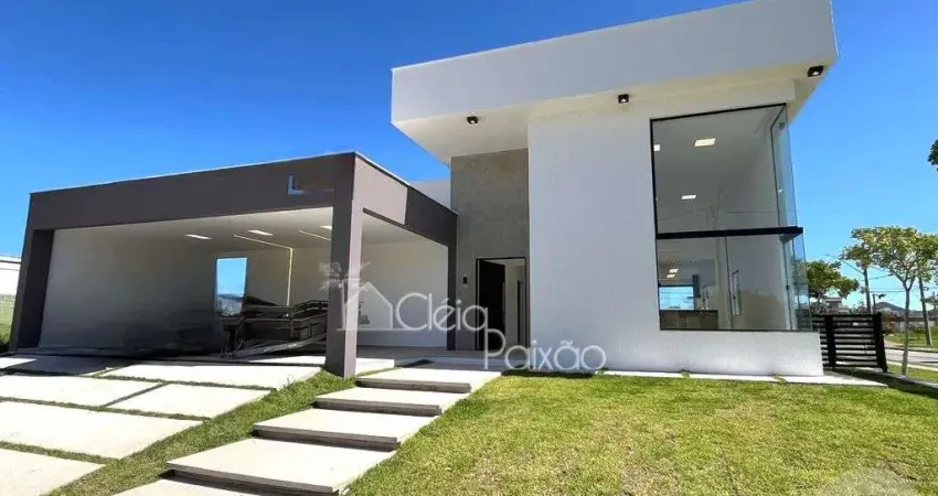 Belíssima casa com 3 suítes à venda em condomínio, maricá rj.