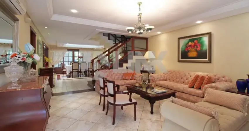 Casa em alto padrão com 4 dormitórios e 4 vagas de garagem à venda no bairro chácara das pedras em poro alegre próxima do shopping iguatemi