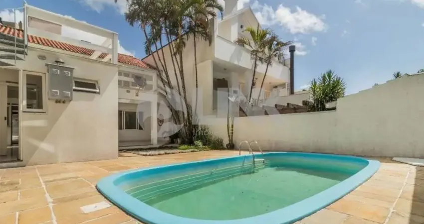 Casa com 4 quartos sendo 1 suíte e 3 vagas de garagem à venda no bairro menino deus em porto alegre
