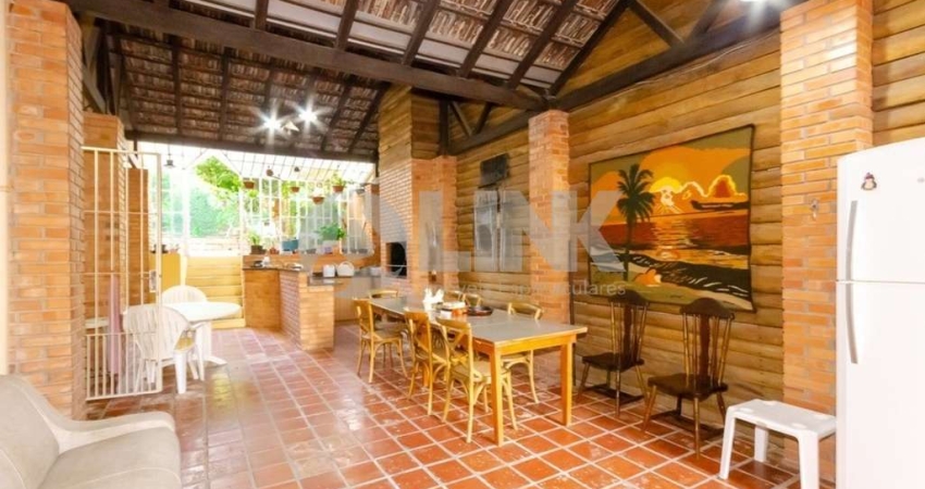 Casa de 4 quartos com 2 vagas à venda no bairro Petrópolis em Porto Alegre