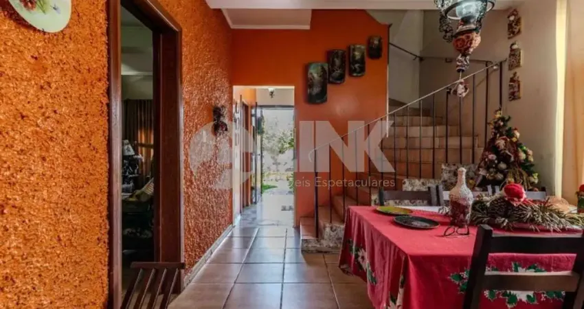 Casa de 4 quartos com 3 vagas à venda no bairro São João em Porto Alegre