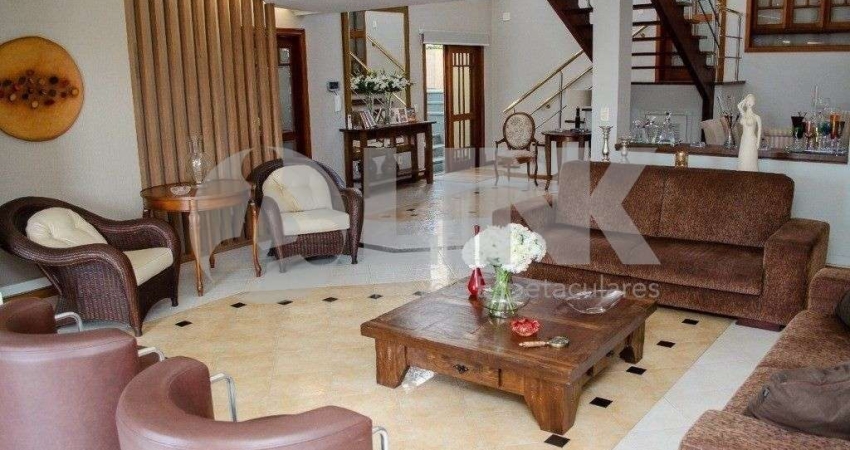 Casa de 5 dormitórios à venda com 4 vagas de garagem em porto alegre, no bairro chácara das pedras