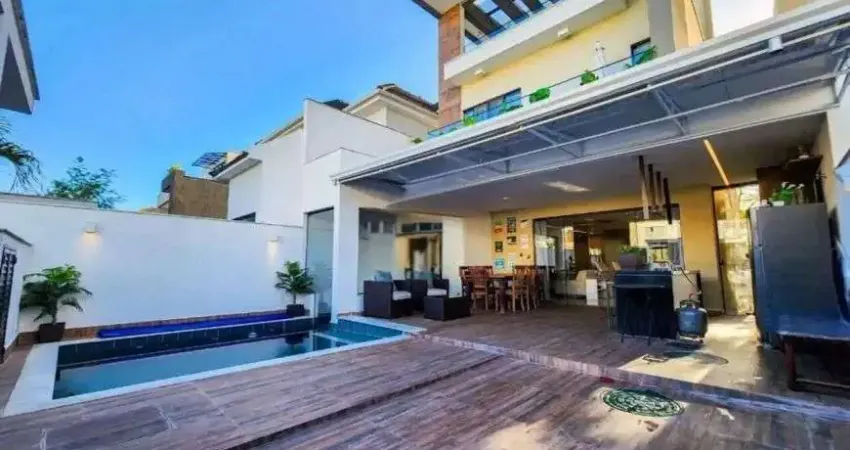 Casa de alto padrão com 5 suítes e lazer completo condomínio botânica nature