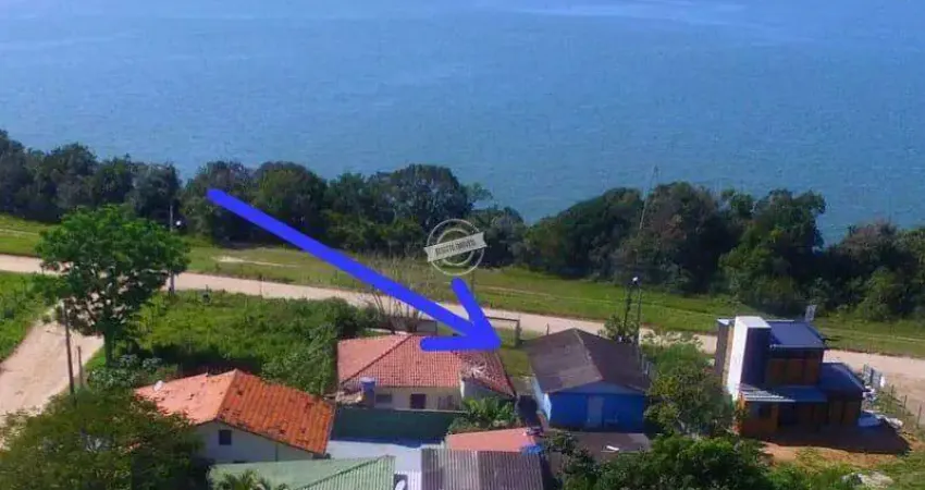 Terreno bairro alto arroio de frente para a lagoa da ibiraquera, medindo 409m² em imbituba-sc