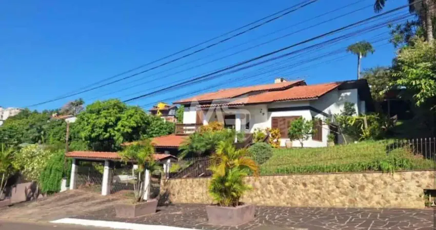 Casa com 4 quartos, sendo 2 suítes, em amplo terreno com pomar ao lado – localizada no bairro ideal em novo hamburgo!