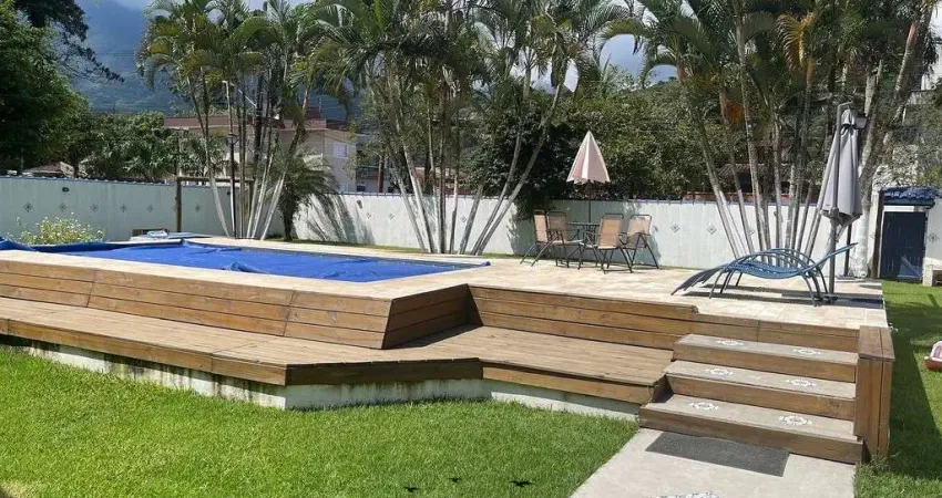 Casa em condomínio fechado com 4 quartos à venda no Massaguaçu, Caraguatatuba