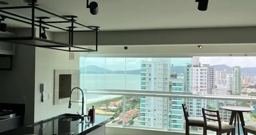 Mobiliado com vista mar definitiva - 2 suítes e 2 vagas de garage