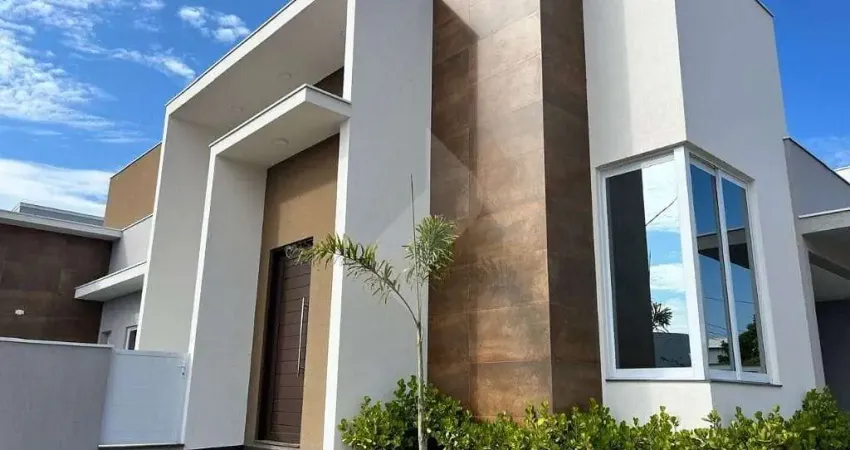 Casa novíssima e moderna com 4 suítes, amplas salas, área gourmet e piscina com aquecimento solar