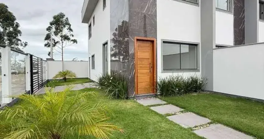 Sobrado de esquina com 2 suítes no loteamento flora a flora, joaia - tijucas