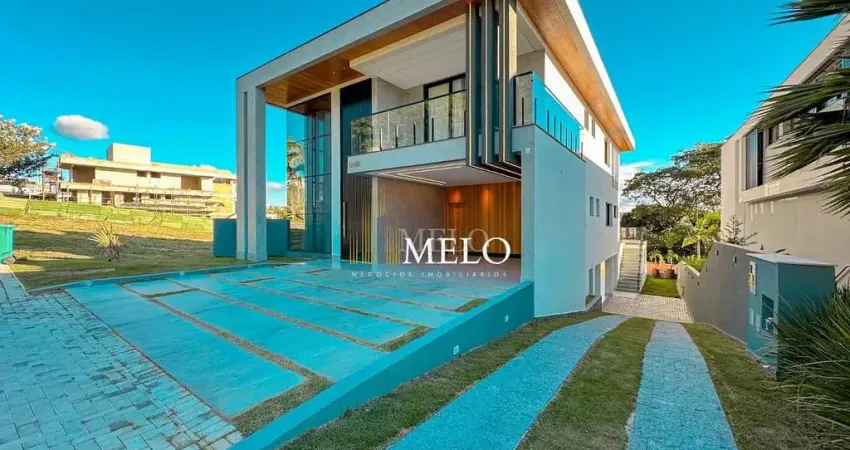 Espetacular casa com fachada imponente e piscina no condomínio alphaville vespasiano