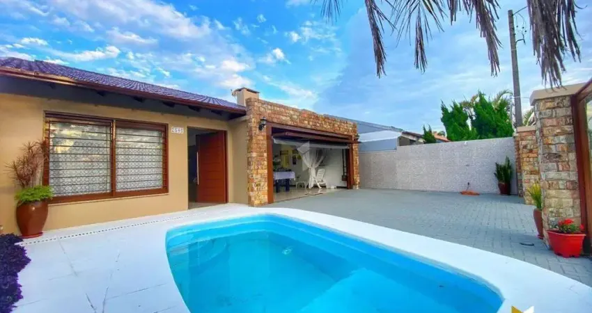 Casa com 3 suítes e anexo pertinho do mar no centro de xangri-lá