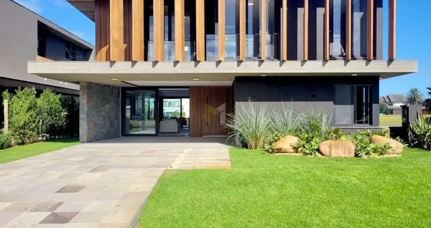 Casa beira de lago decorada no condomínio enseada xangri-lá