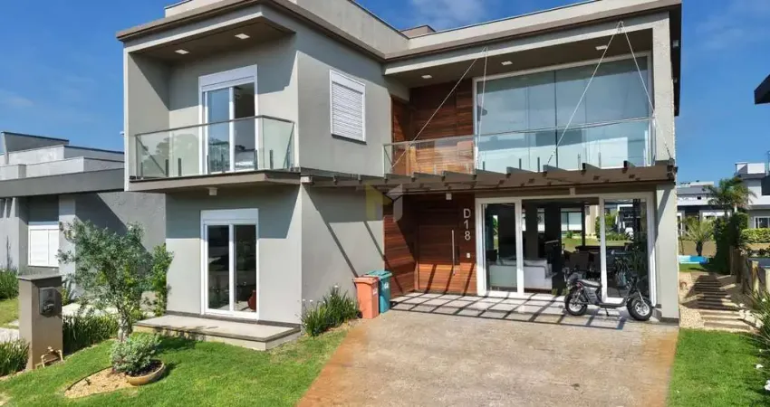 Casa 4 dormitórios 3 suítes beira lago living pé direito duplo capão da canoa