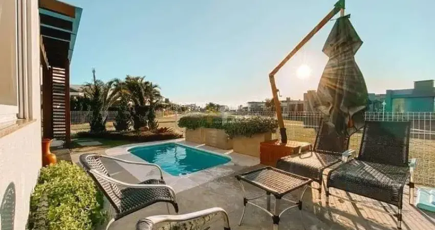 Casa térrea com piscina no condomínio Riviera em Xangri-lá RS