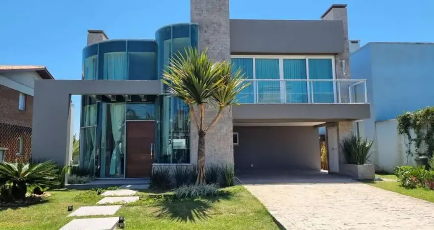 Sobrado com 4 suítes e piscina no condomínio Ventura em xangri-lá RS