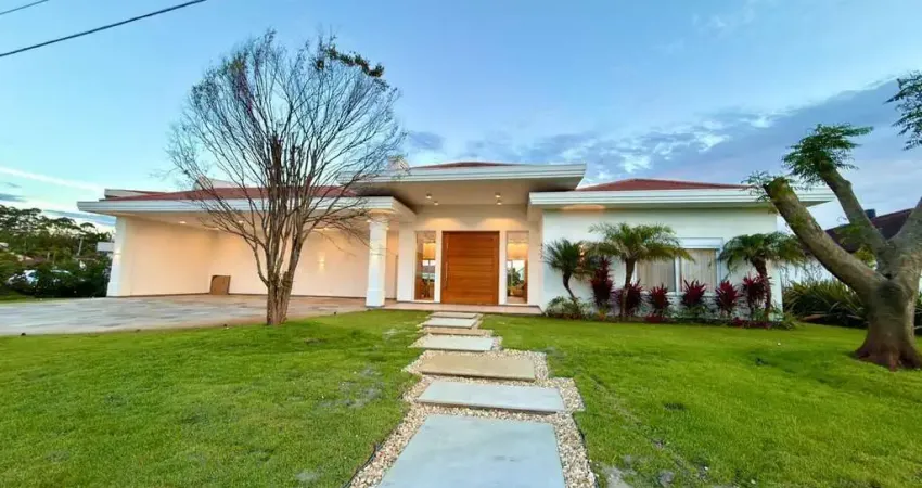 Casa térrea beira lago no condomínio Green Village em Xangri-lá RS