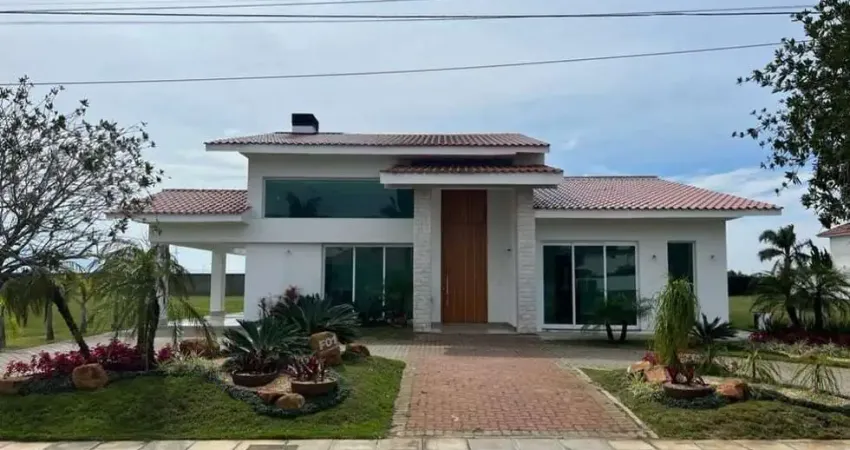 Casa térrea com 4 suítes no condomínio Green Village em Xangri-lá RS