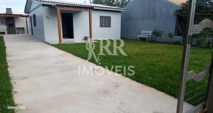 Imóvel de alvenaria, mobiliado, três dormitórios sendo um suíte, localizado em imbé