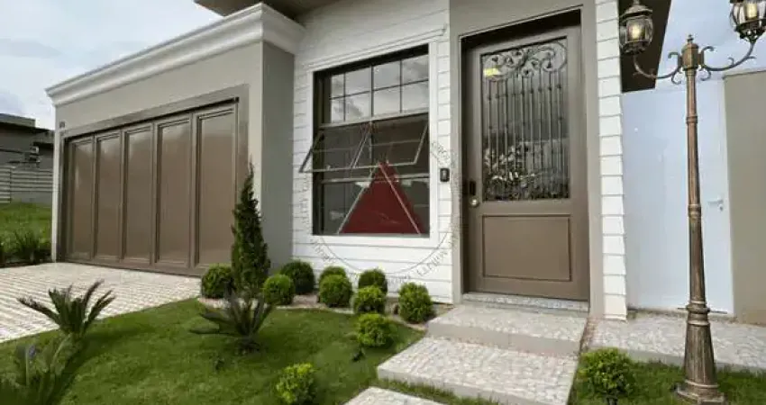 Casa à venda com 3 suítes, salas de tv, jantar e estar, cozinha, área gourmet com piscina e 3 vagas