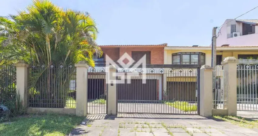 Casa à venda com 4 quartos no bairro cristal, porto alegre (frente) – piscina, churrasqueira e 4 vagas