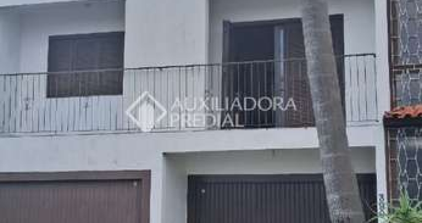 Casa com 3 quartos à venda na Rua Ângelo Passuelo, 390, Vila Nova, Porto Alegre