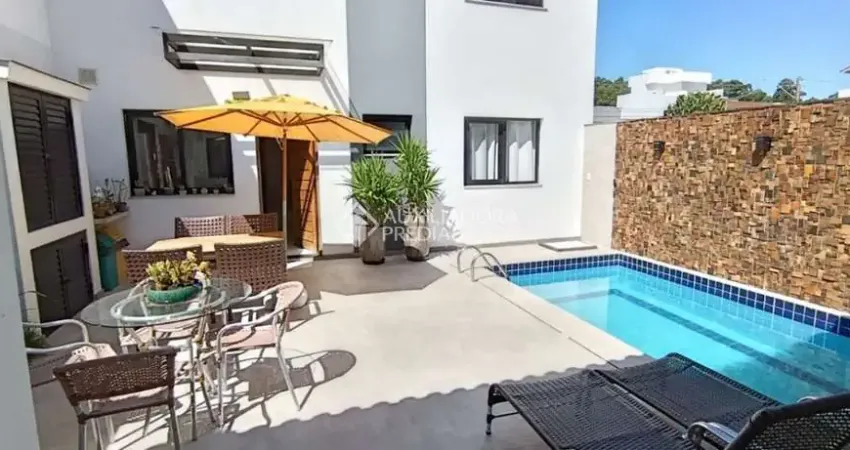 Casa com 4 quartos à venda na Rua Nestor José Nitschke, 181, Guarujá, Porto Alegre