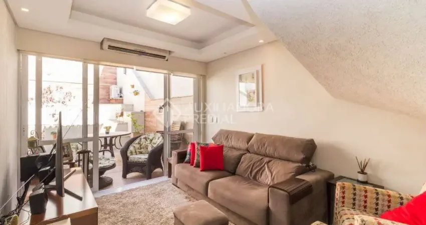 Casa em condomínio fechado com 3 quartos à venda na Rua Joaquim Cruz, 331, Santo Antônio, Porto Alegre