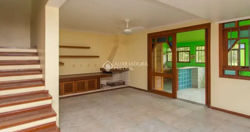 Casa com 3 quartos à venda na Rua Augusto Lourenço Martins, 110, Vila Nova, Porto Alegre